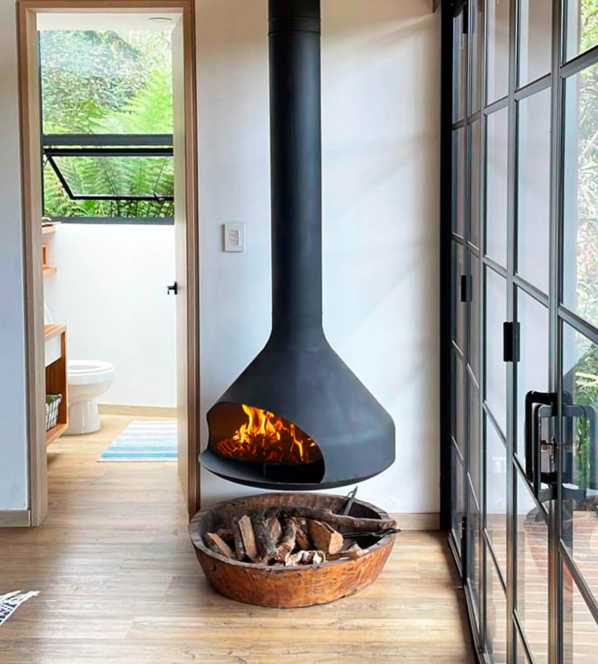 Chimenea colgante Astral en ambiente contemporáneo - Diseño bogotano premium
